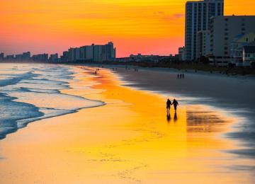 Walking on beach at sunset - Myrtle Beach